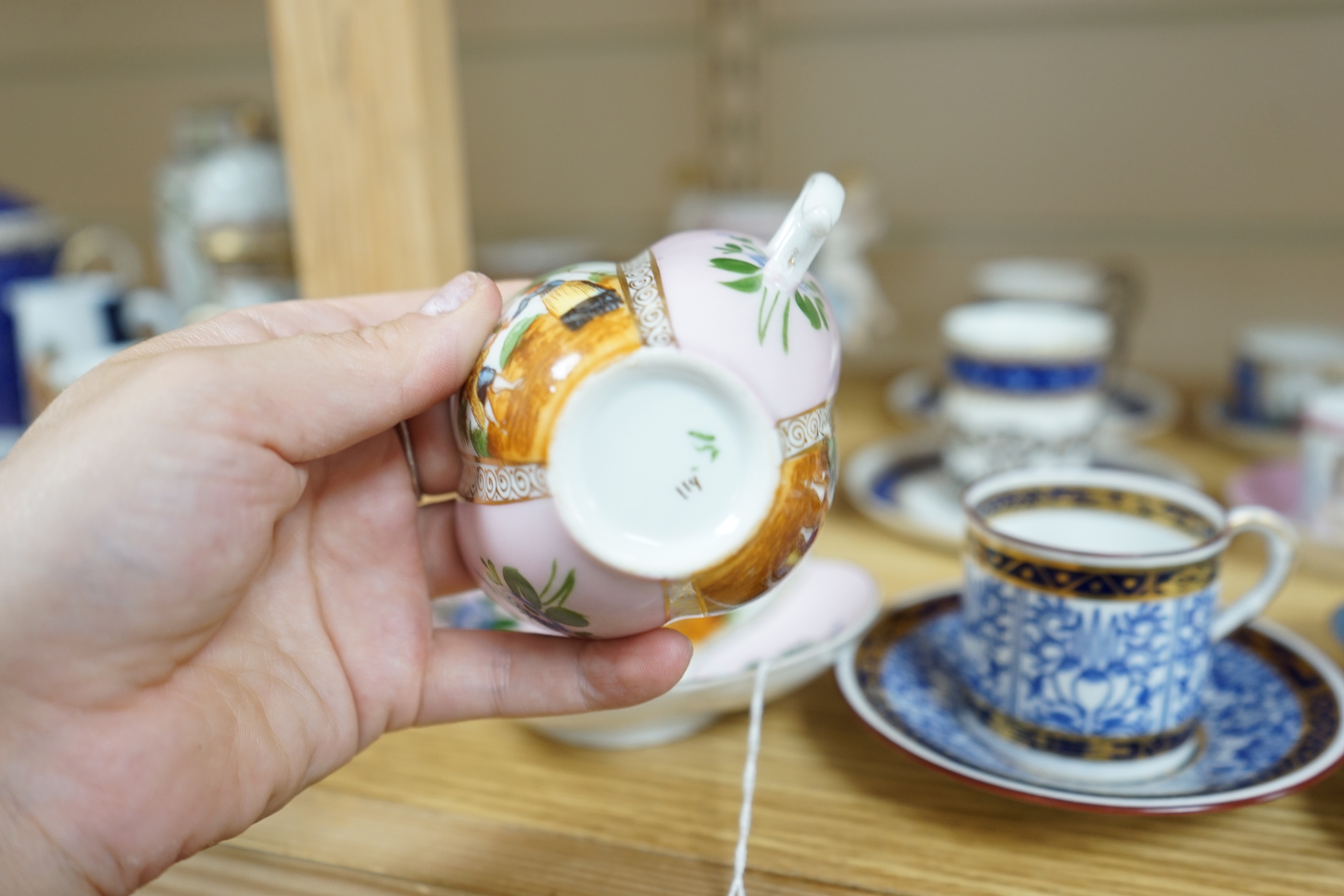 A quantity of various European porcelain including two silver mounted coffee cups